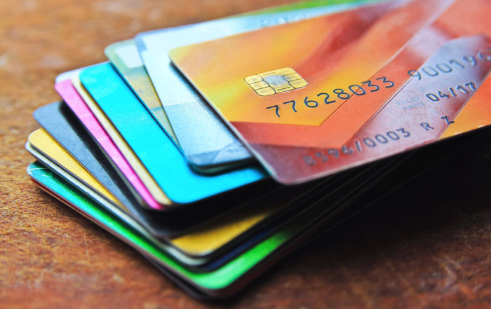 Big stack of multicolored credit cards