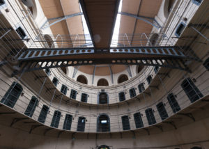 Hallways and metal bars of an empty prison
