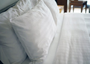 white soft pillows on a white luxury cozy bed