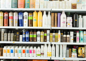 Hair care products arranged in a shelf in the stores